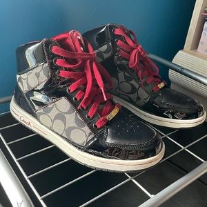 Black and Red coach sneaker.